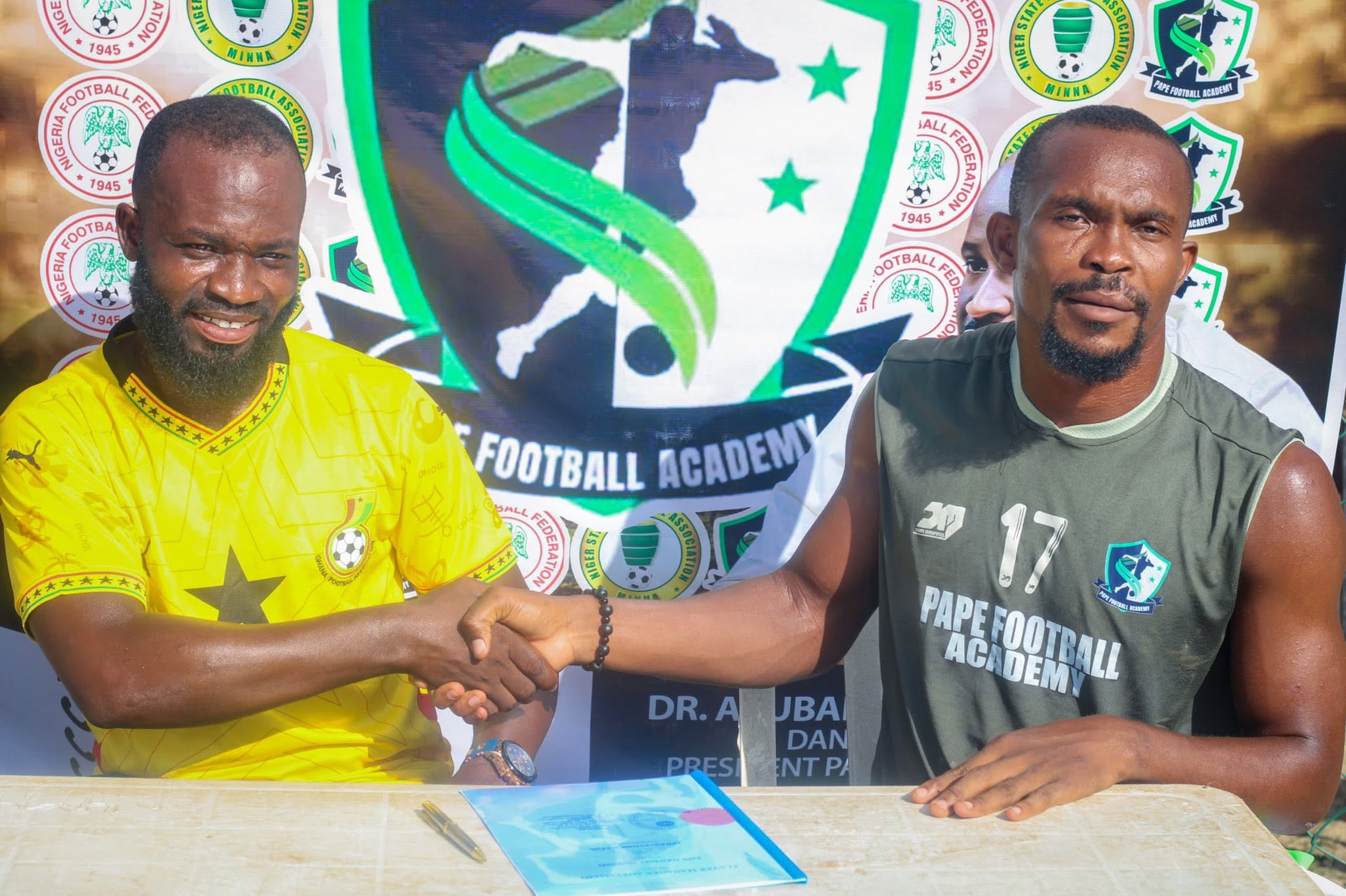Handshake sealing an official player registration
